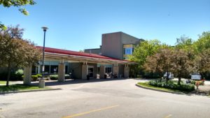 Exterior of building and parking lot at peopleCare AR Goudie