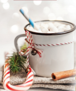 Mug of hot chocolate with candy cane