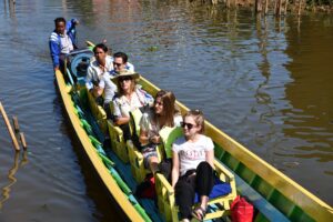 Brent & Heather Gingerich and family in canoe in Myanmar