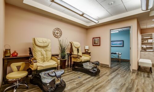 Massage chairs in spa at Oakcrossing Retirement Living