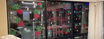 A window at Meaford LTC painted to say It's the most wonderful time of the year